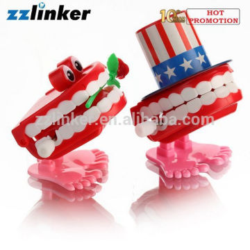 LK-S13 Dental Crafts Wind Up Toy Jumping Dentes com Rose